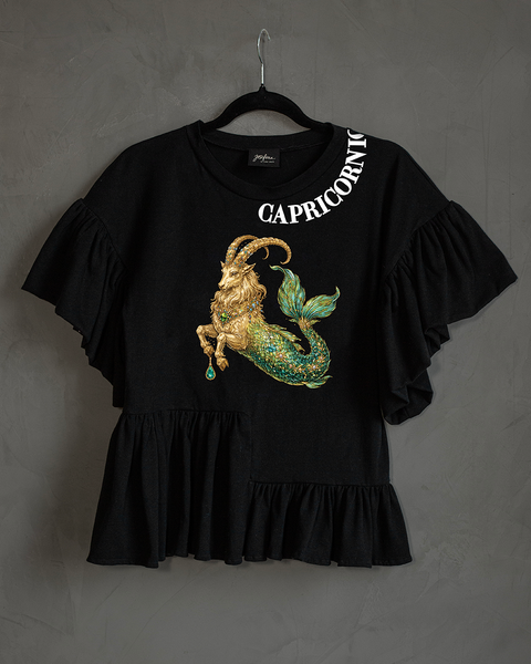 Blusa con olanes Capricornio