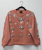 Sudadera dust pink con prendedores