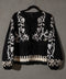 Top negro con lazos al frente con grecas y flores