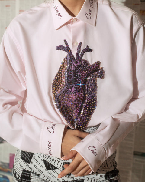 Camisera lila con corazón