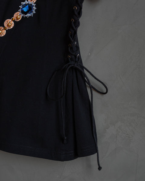 Blusa negra con cintillas rosary